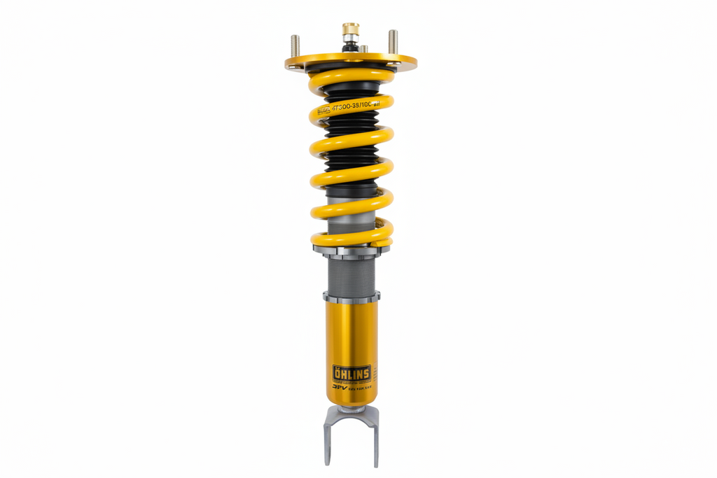 Yellow shock absorber with Ohlins branding on a white background