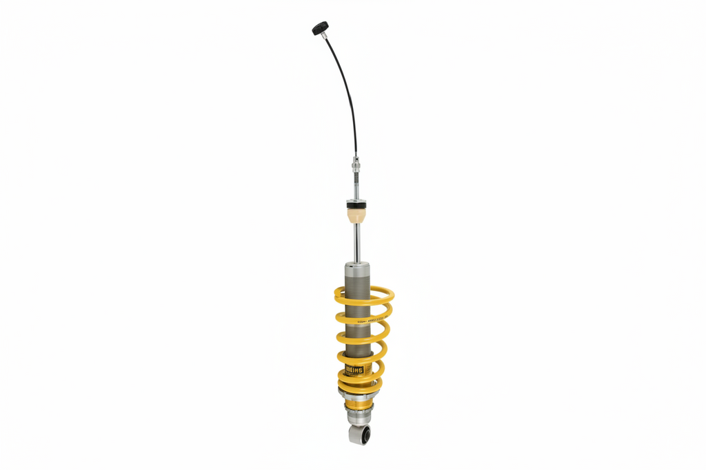 Motorcycle shock absorber with yellow coil spring on a white background